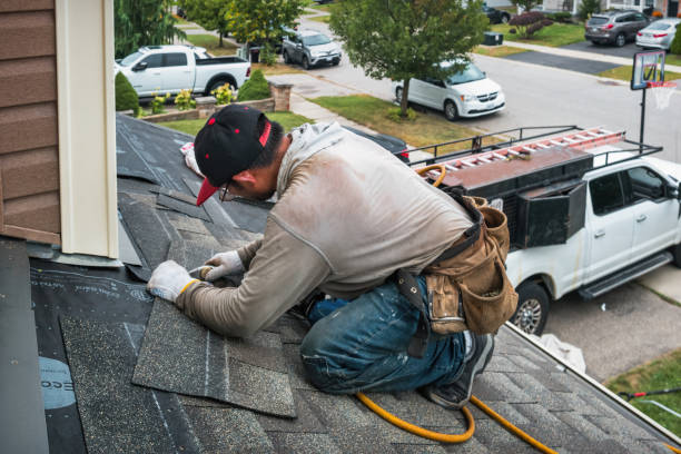 Professional Emergency Roof Repair technician working in South Royalton, VT